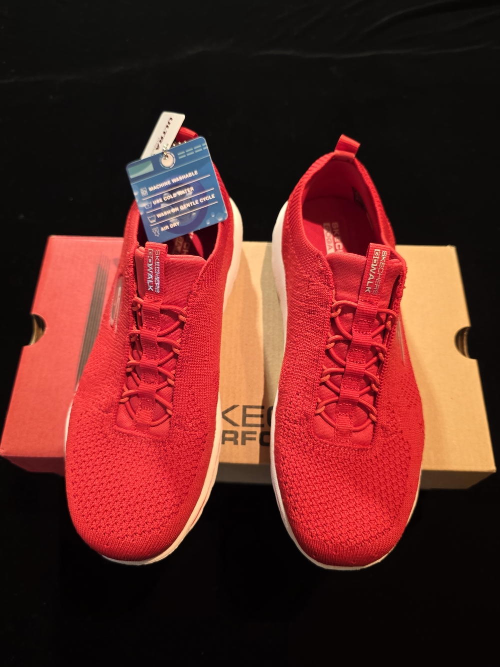 Skechers Red Slip-On Knit Sneakers